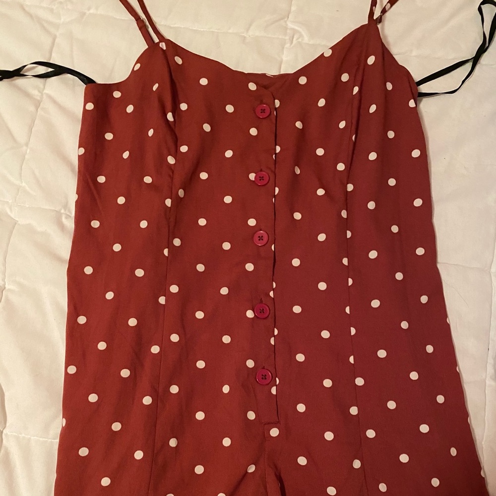 red/white polka-dot romper